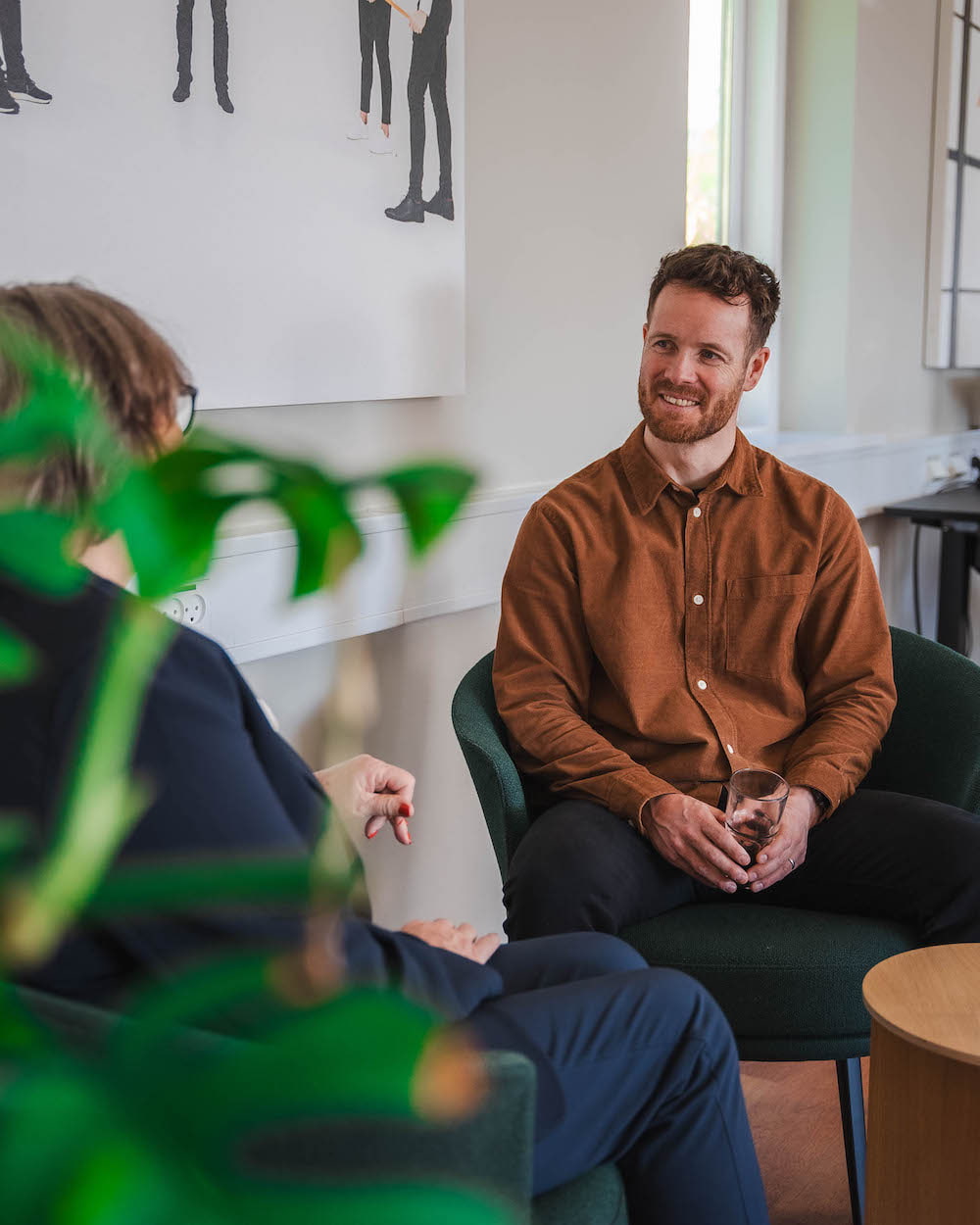 Coachende samtale i forbindelse med et sundhedstjek på arbejdspladsen